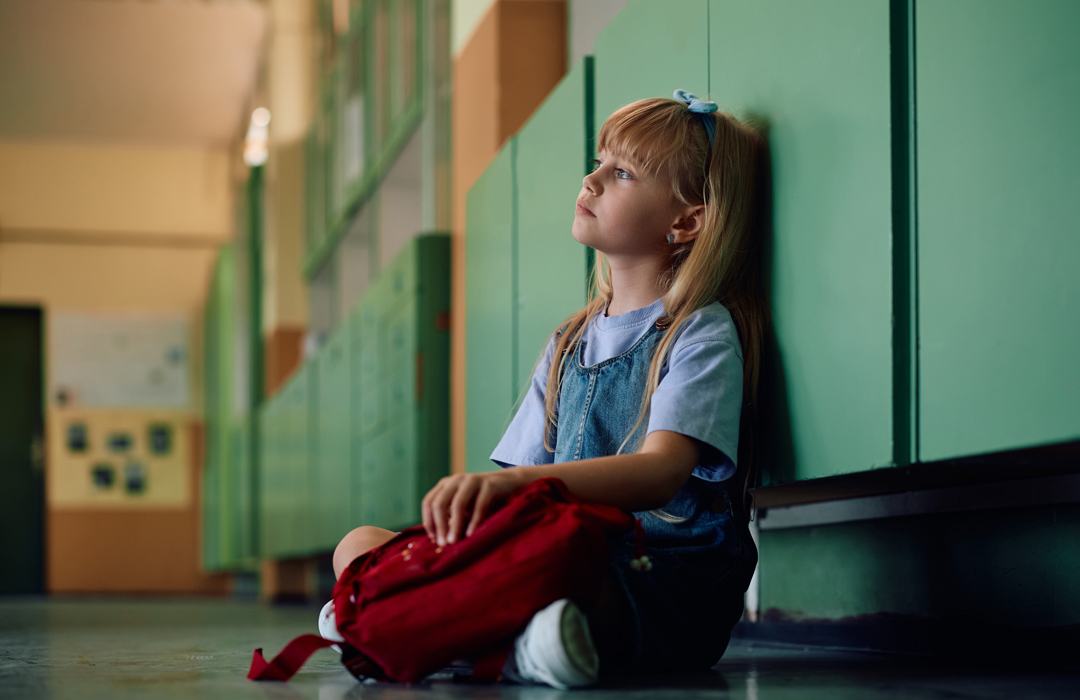 Pensive Little Girl Sitting Alone At School Hallwa 2024 12 13 22 27 47 Utc