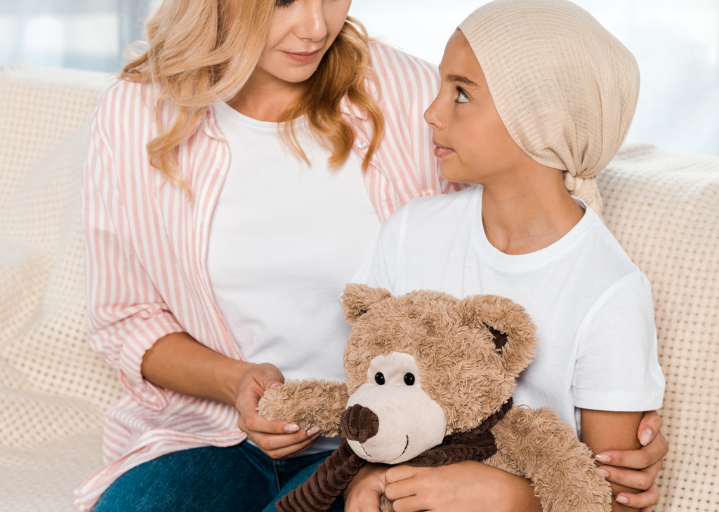 Attractive Mother Sitting On Sofa With Sick Kid Wi 2024 11 09 21 28 06 Utc