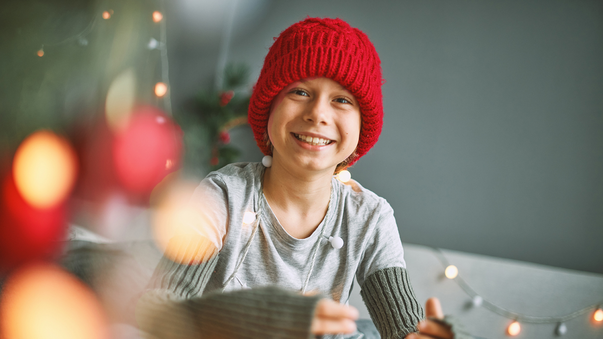 Envato Kid In Red Hat With Happy Face Enjoying With Light 2023 11 27 04 56 26 Utc Web (1)